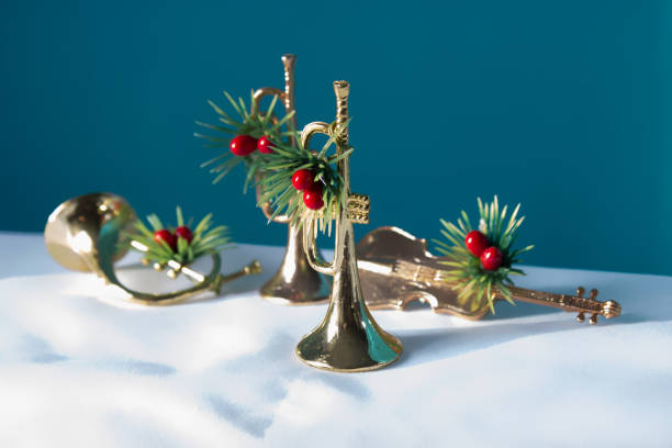Seasonal Christmas and the holidays musical instrument trumpet with dramatic lighting
