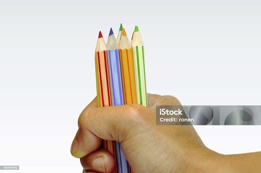 Hand holding color pencils  Abstract Stock Photo
