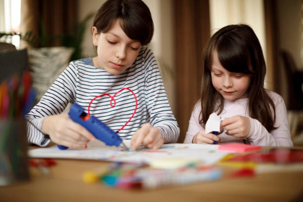 istock Sisters playing together at home 924962044