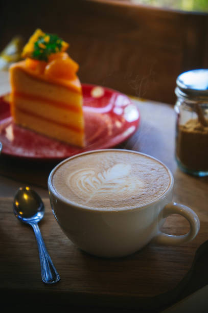 istock coffee cup and tasty cake on wood table and Blank paper waiting for ideas , coffee time work 924962818