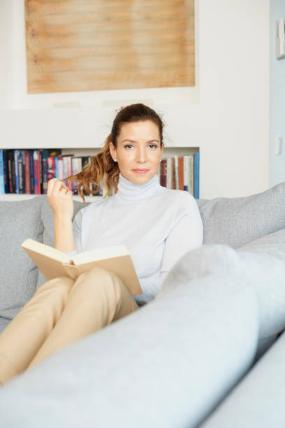 istock Relaxing with my favourite book 924963534