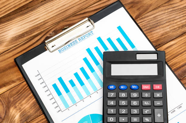 istock Clipboard with financial documents and calculator on the table. 924968280