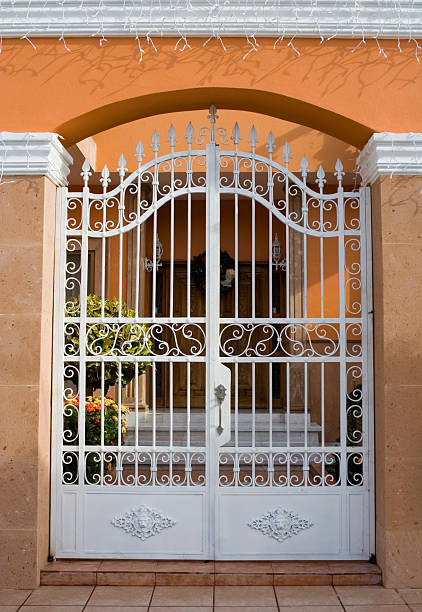 istock Salmon Colored Stucco Gated Entrance 92496973
