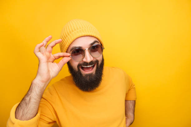 istock Bright hipster man in trendy sunglasses 924969804