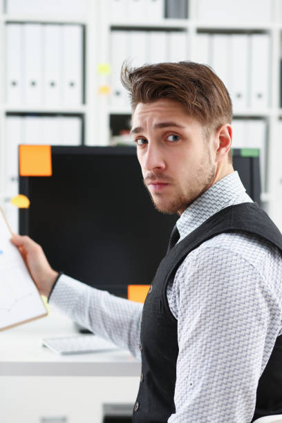 istock Young smile man at office workspace closeup 924972474