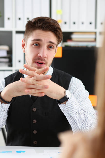 istock Handsome man in suit offer contract form 924972638
