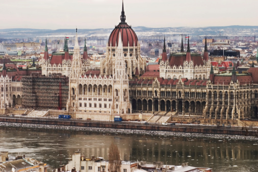 The awe-inspiring beauty of the Budapest Parliament Building, an architectural masterpiece set on the banks of the majestic Danube River. This iconic landmark of Hungary stands as a testament to the city's rich history and serves as the seat of government. With its intricate neo-Gothic design and symmetrical facades, the Budapest Parliament Building exudes grandeur and leaves a lasting impression on visitors.