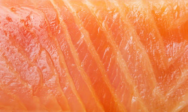 istock Red fish fillet texture as food background. Close up. 924977800