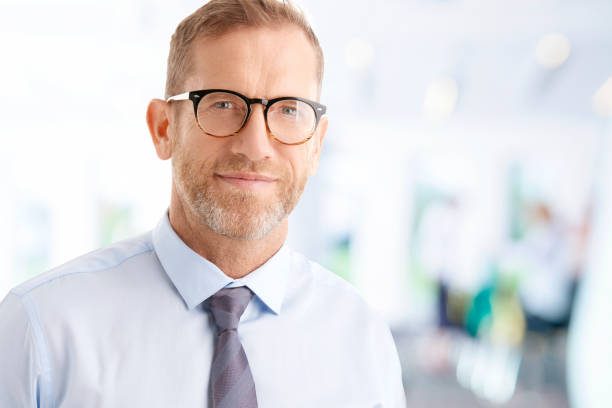 istock Smiling middle aged businessman portrait 924978156