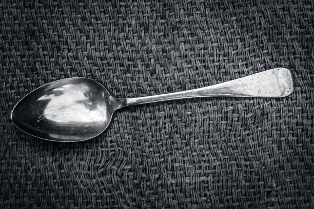 Vintage brass spoon on gunny bag.