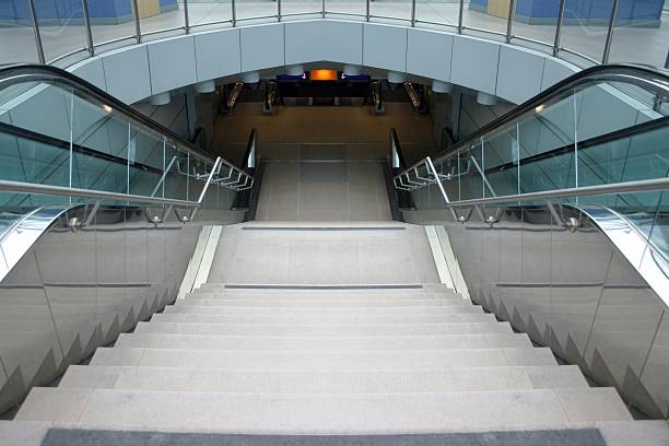 istock Escalator in subway station, symmetric 92498713