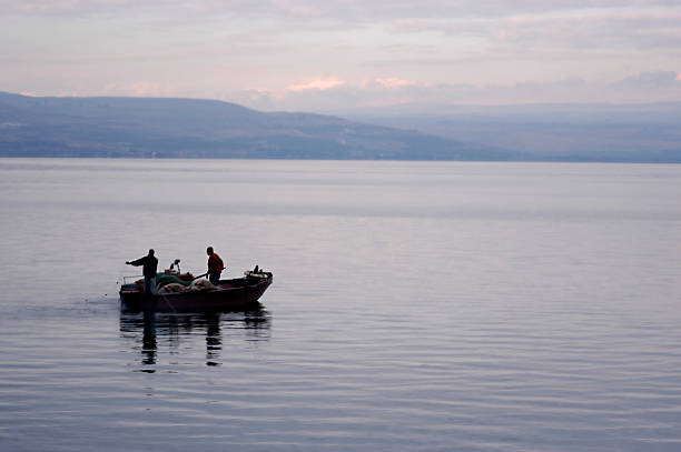 рыбаки - lake tiberius стоковые фото и изображения