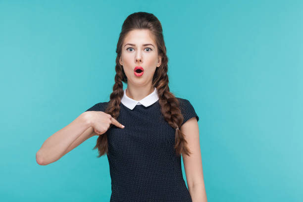 istock Successful win businesswoman pointing finger himself, looking at camera 925000614