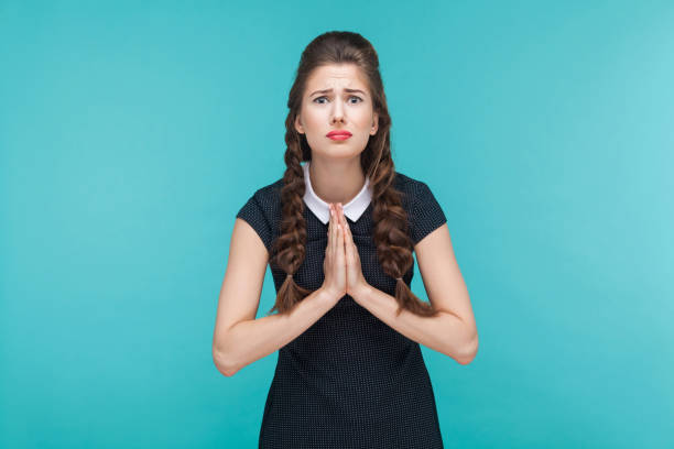 istock Apologize woman looking at camera and hope. 925000682