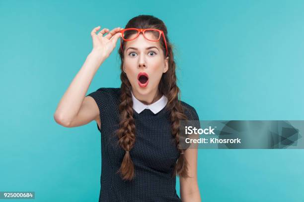 Surprised Woman In Red Glasses Amazement Looking At Camera Stock Photo - Download Image Now