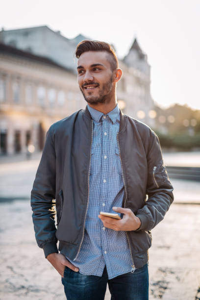 istock Young man waiting for friends in downtown 925000950
