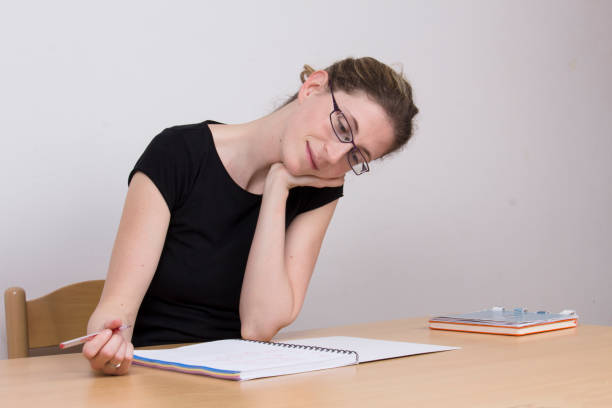 istock Girl writting in her diary 925004814