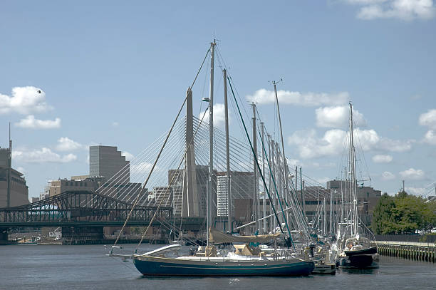 Sailing boats under Zakim bridge, Boston stock photo