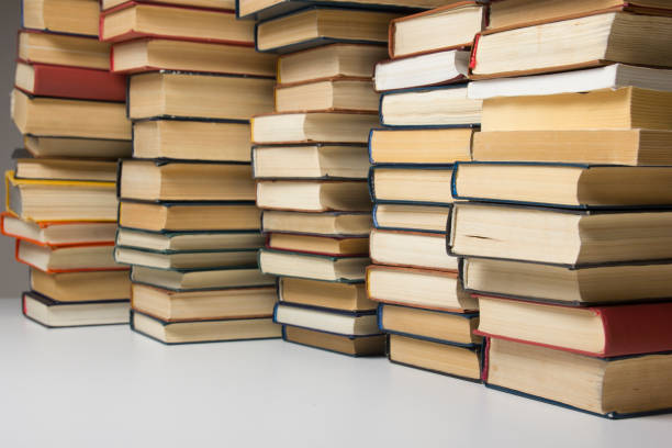 istock Stack of books background. many books piles. 925006088