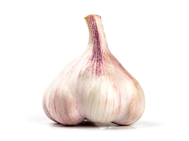 istock Raw fresh garlic isolated on white background 925008696