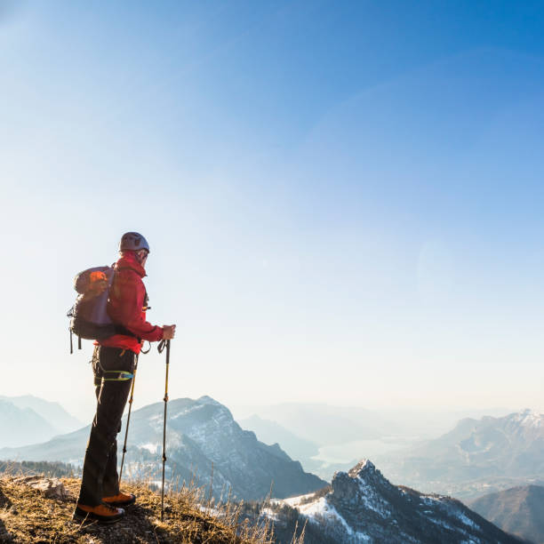 istock Alone climber lokking at mountain 925009198