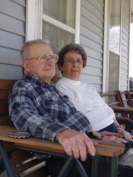 istock Senior couple on front porch 92501064