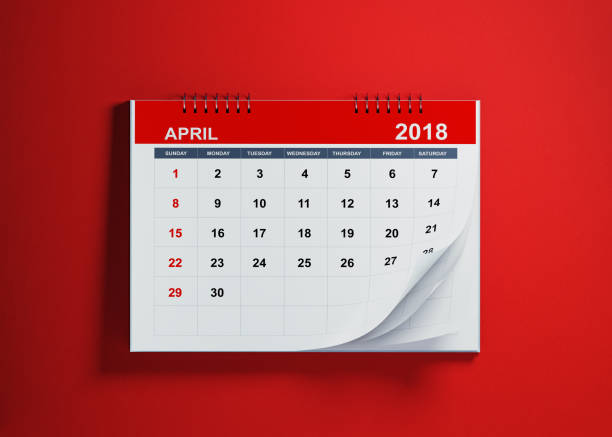 April Calendar On Red Background Pages of a red calendar on blue background are folding.  April page. Horizontal composition with copy space. Calendar and reminder concept. 2018 calendar stock pictures, royalty-free photos & images