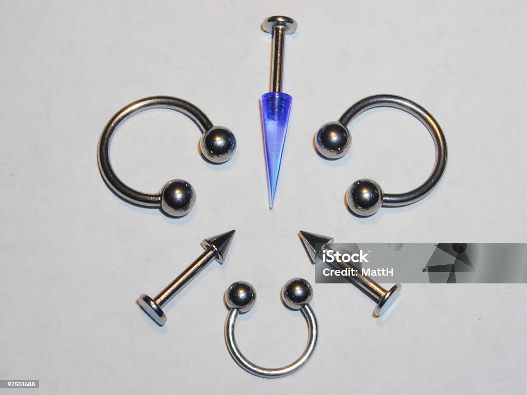 Circular Barbells and Labret Studs  Pierced Stock Photo