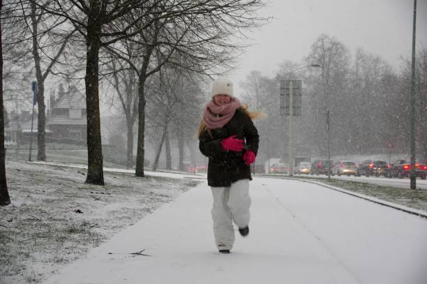 istock Girl having snow fun 925016984