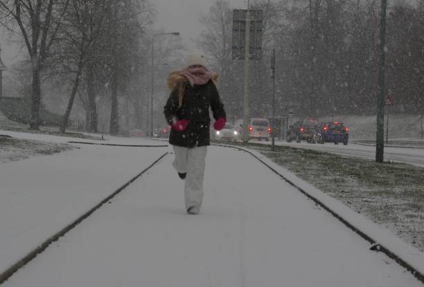 istock Girl having snow fun 925017000