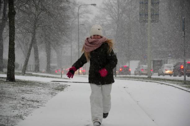 istock Girl having snow fun 925017910