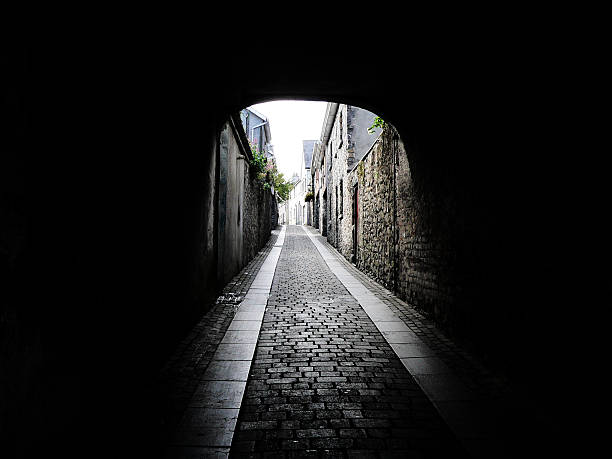 istock Dark Arched Alleyway over ancient cobbled road 92502143