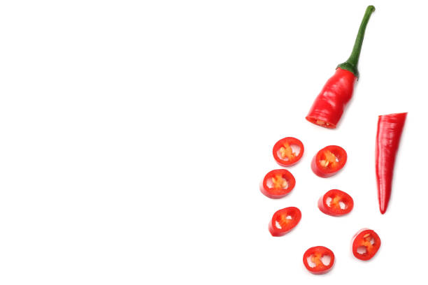 istock sliced red hot chili peppers isolated on white background top view 925021472