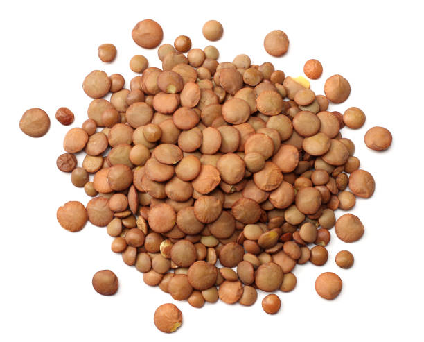 istock Pile lentil isolated on white background. Top view. 925021570