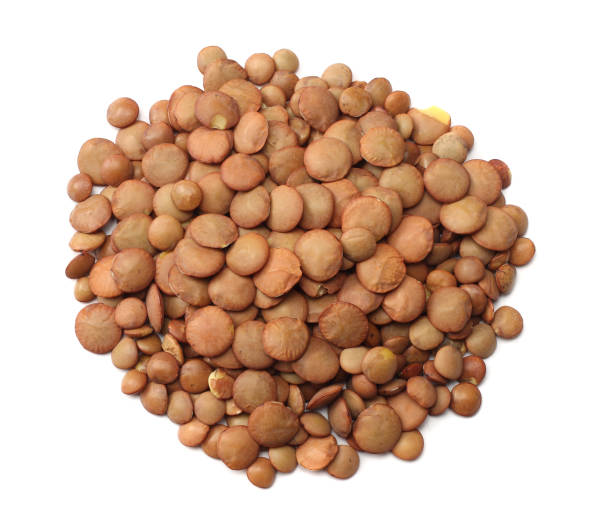 istock Pile lentil isolated on white background. Top view. 925021588