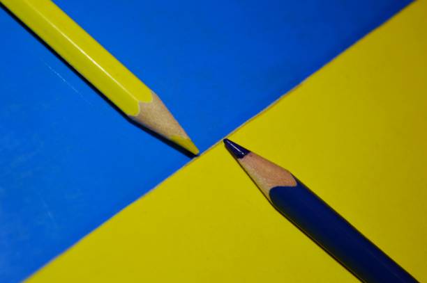 yellow and blue wooden pencil