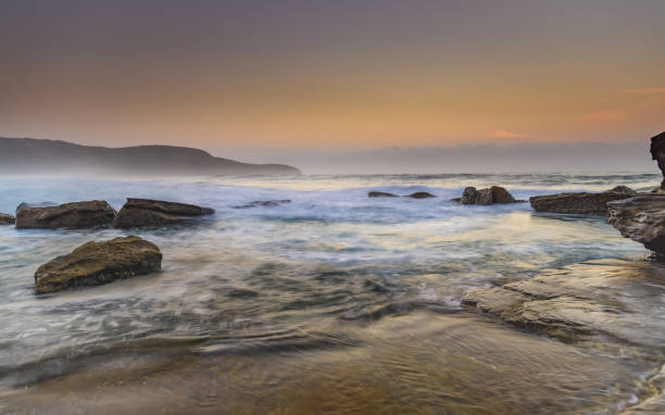 istock Hazy Sunrise Seascape 925025148