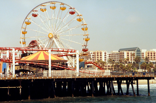 Ferris wheel at an amusement park on top of the Santa Monica Pier in Los Angeles, California