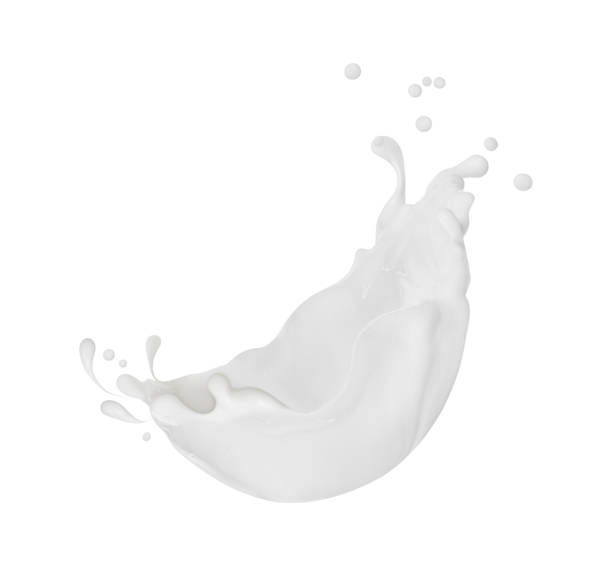 splashes of milk or cream close-up isolated on white background - drink close up dairy product flowing imagens e fotografias de stock