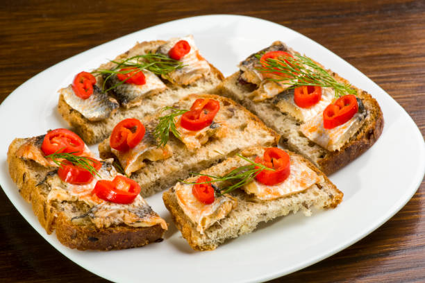 istock sandwiches with herring, red pepper and dill 925032992