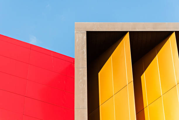 istock Blue sky red and yellow wall abstract background 925037580