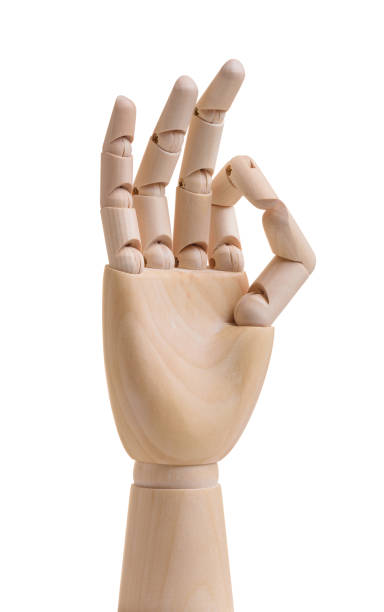 istock Wooden hand shows ok gesture. Isolated on white background 925043352