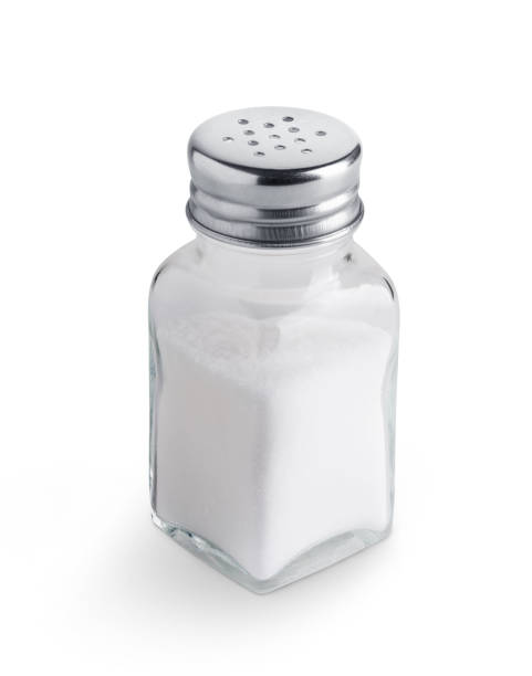 shaker di sale isolato su sfondo bianco - salt room foto e immagini stock