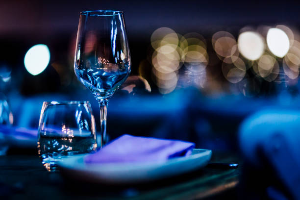 istock Luxury table settings for fine dining with and glassware, beautiful blurred  background. For events, weddings. 925044258