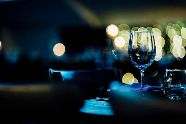 istock Luxury table settings for fine dining with and glassware, beautiful blurred  background. For events, weddings. 925046738