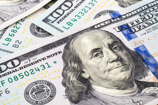 istock New one hundred dollar bills background 925046968