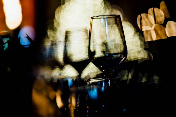 Luxury table settings for fine dining with and glassware, beautiful blurred  background. For events, weddings.