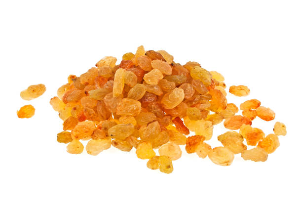 istock Yellow raisins isolated on white background 925047694