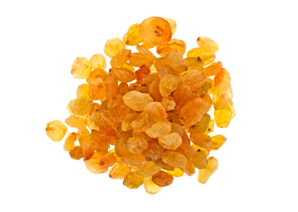 istock Yellow raisins isolated on white background, top view 925047712