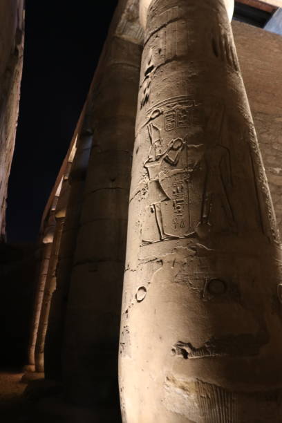 istock Illuminated hieroglyphic Column at temple of Luxor 925047806